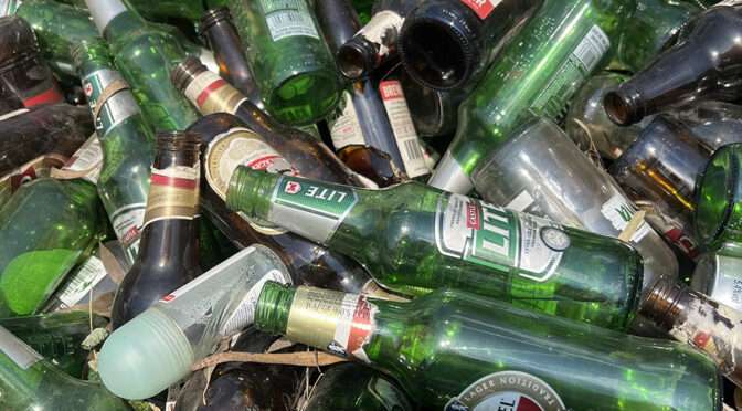 Glass bottles before being crushed in the Pilot Modular BR0605 HSI crusher.